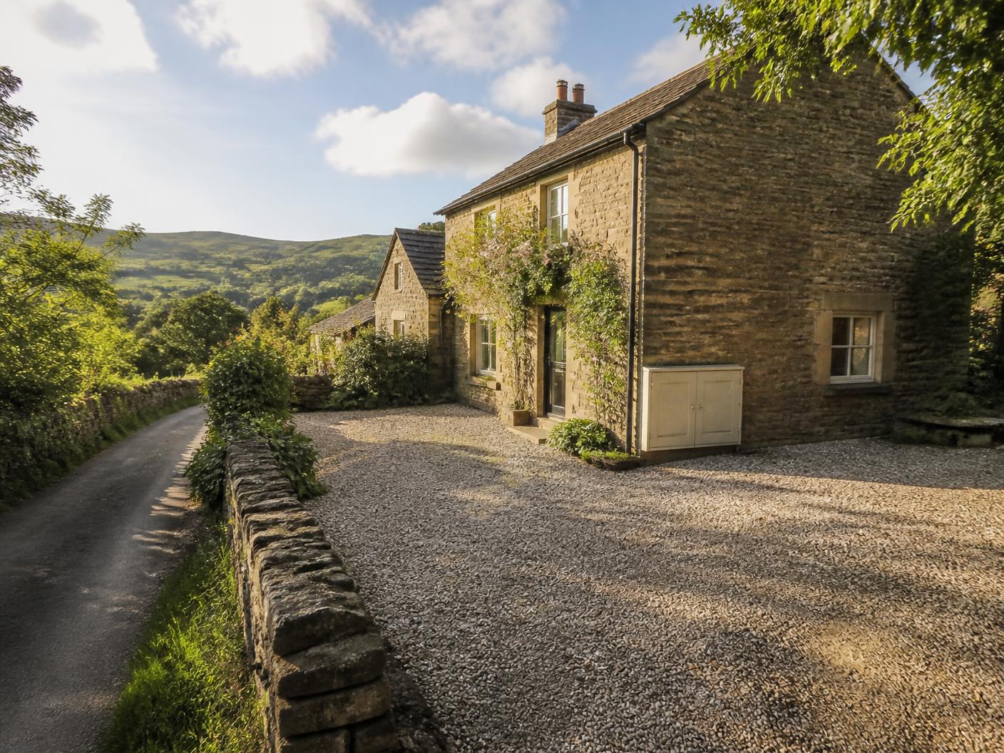 Stone holiday cottage with off-road guest parking being assessed for EV charging